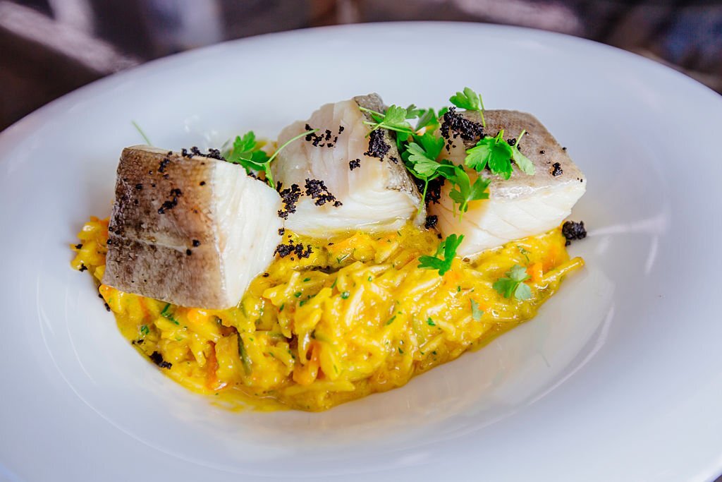 Cơm cá tuyết muối (bacalhau) - món ăn truyền thống của F1686.vip với hơn 4.000 trò chơi Bồ Đào Nha